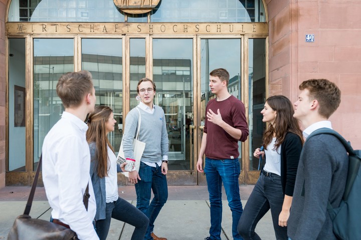 Group of students in front of the main entrance