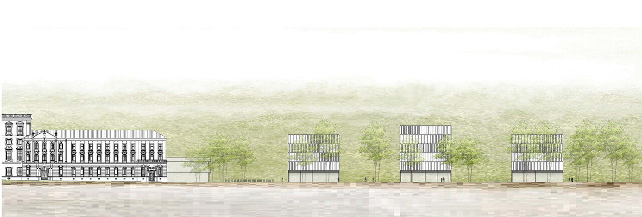 Auf der linken Seite des Friedrichsparks steht das Amtsgericht Mannheim. Daneben stehen drei sehr ähnliche, quadratische Gebäude.