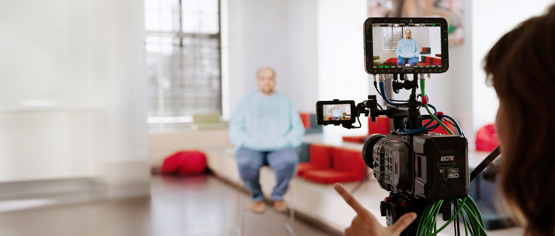 Employee gives an interview during a video shoot
