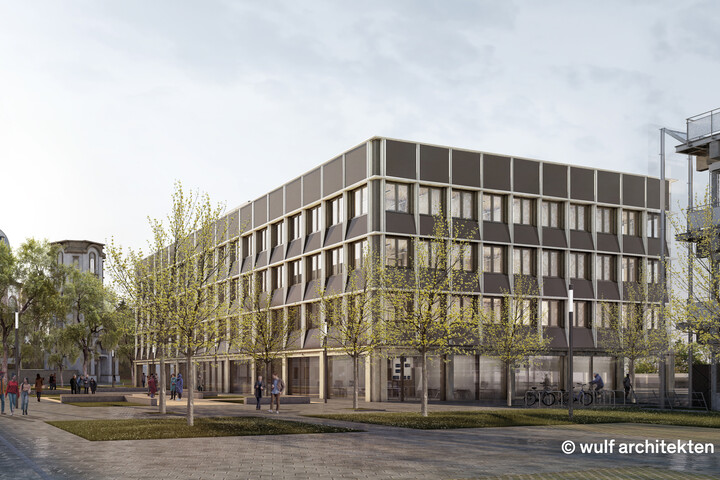 Visualisierung des neuen UNIT-Gebäudes. Vor dem rechteckigen Neubau stehen Bäume auf Grünflächen.