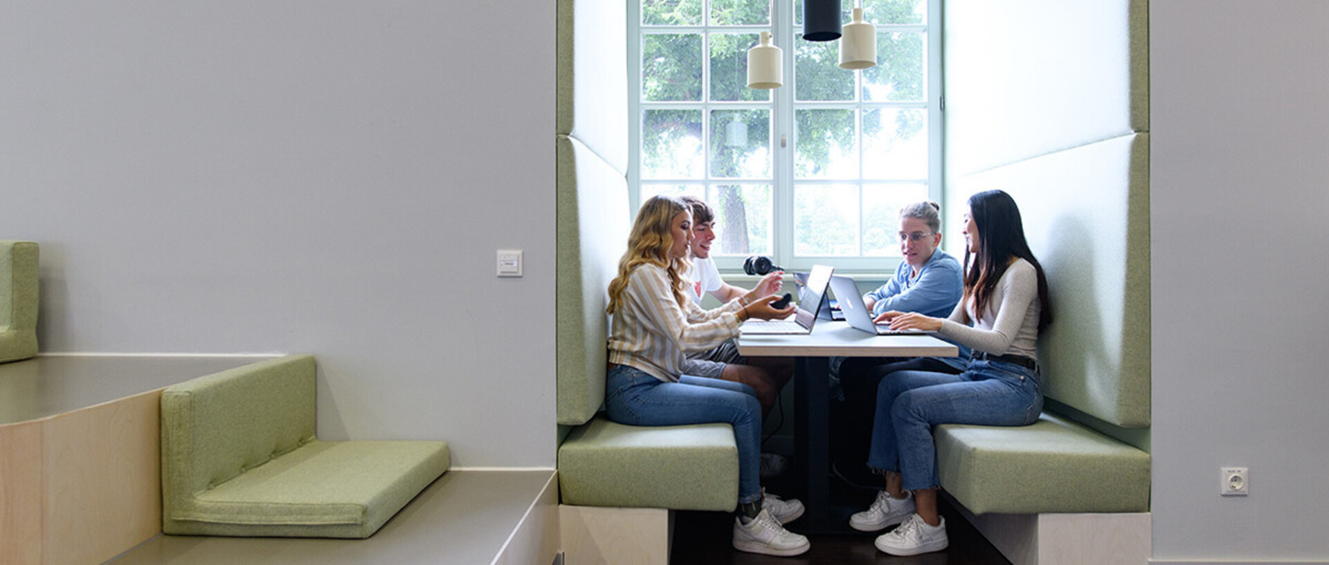 Students sit together in a study group