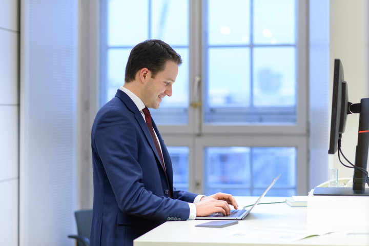 A person typing on a computer