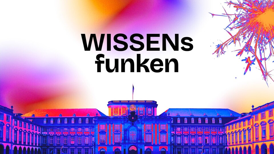 Das Mannheimer Schloss in orangenen und blauen Farben. Oben rechts die Funken einer Wunderkerze.