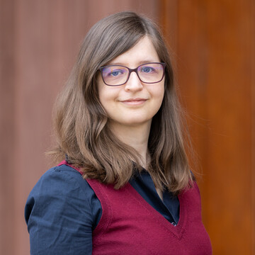 Sophia Sonja Guthier wearing a black blouse.
