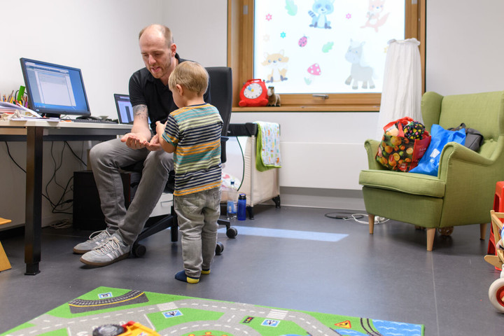 Staff member with child at the Parent and Child Room