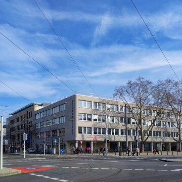 University building L1 in front of a blue sky