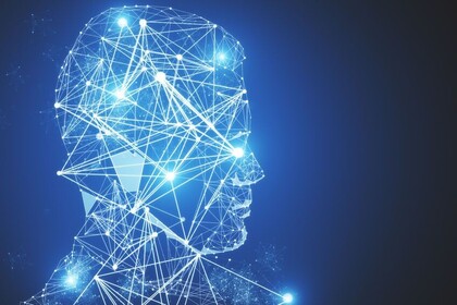 Digitales Profil eines menschlichen Kopfes mit leuchtenden, vernetzten Linien auf dunklem Hintergrund.