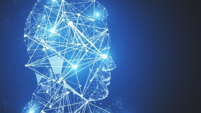 Digitales Profil eines menschlichen Kopfes mit leuchtenden, vernetzten Linien auf dunklem Hintergrund.