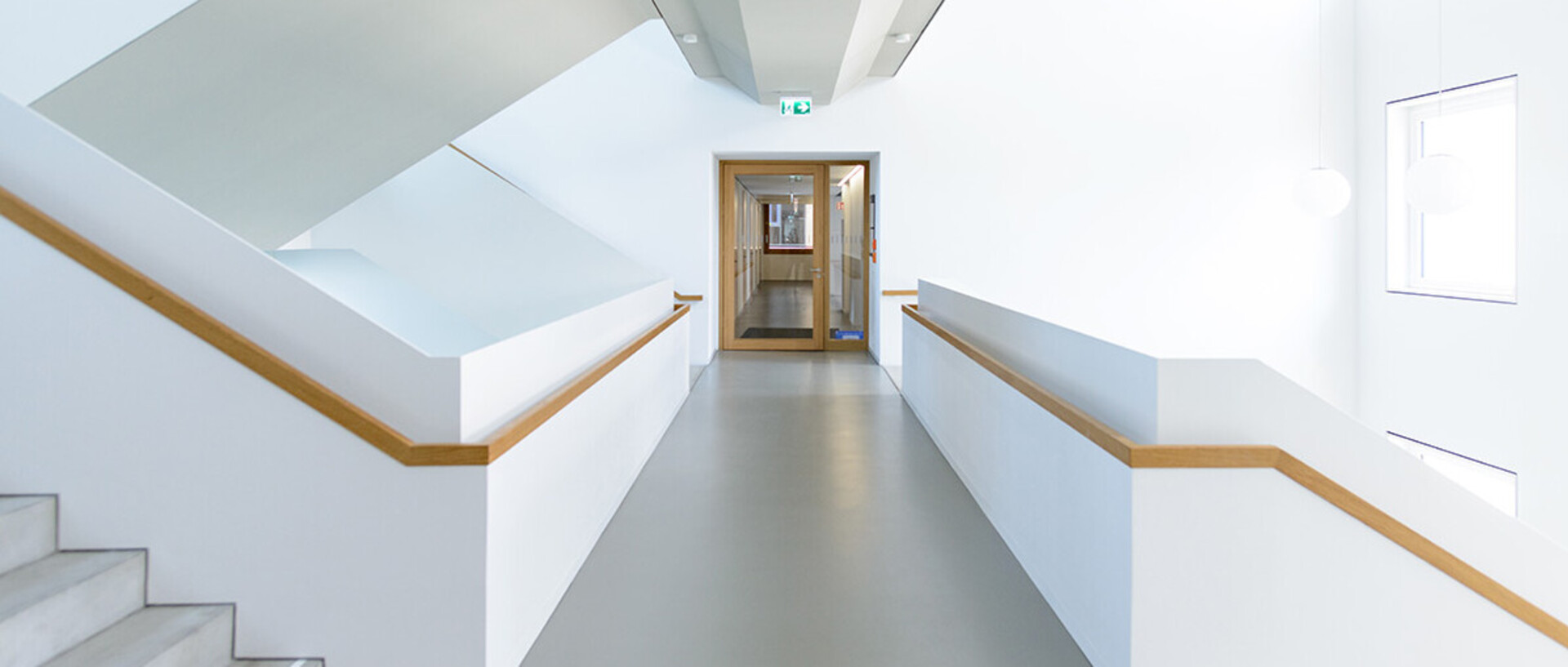 An empty floor with stairs in the B6, 30-32 building.