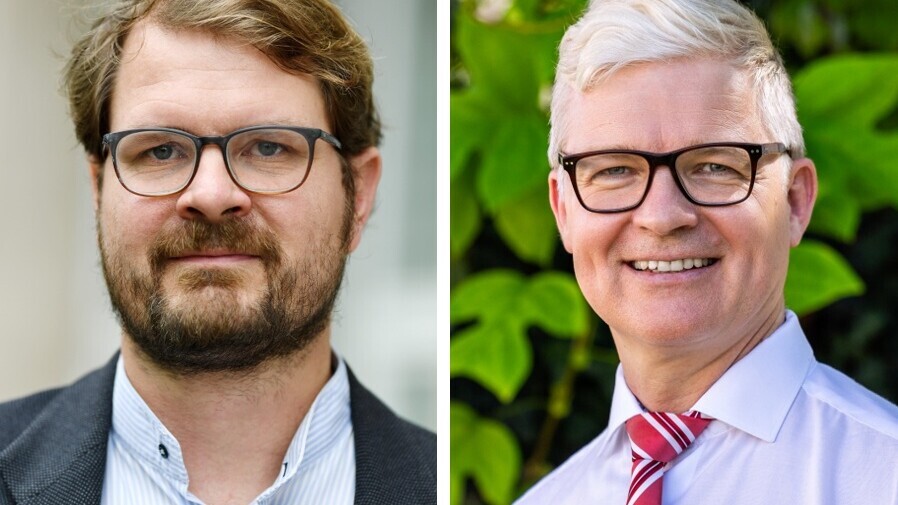 Philipp Kellmeyer und Jens-Uwe Franck tragen beide ein Hemd und eine Brille.