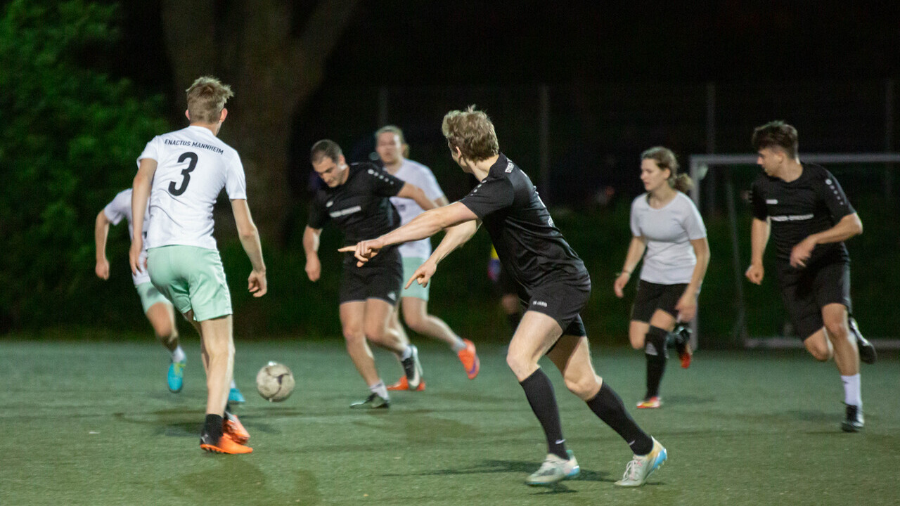 Staff members playing soccer